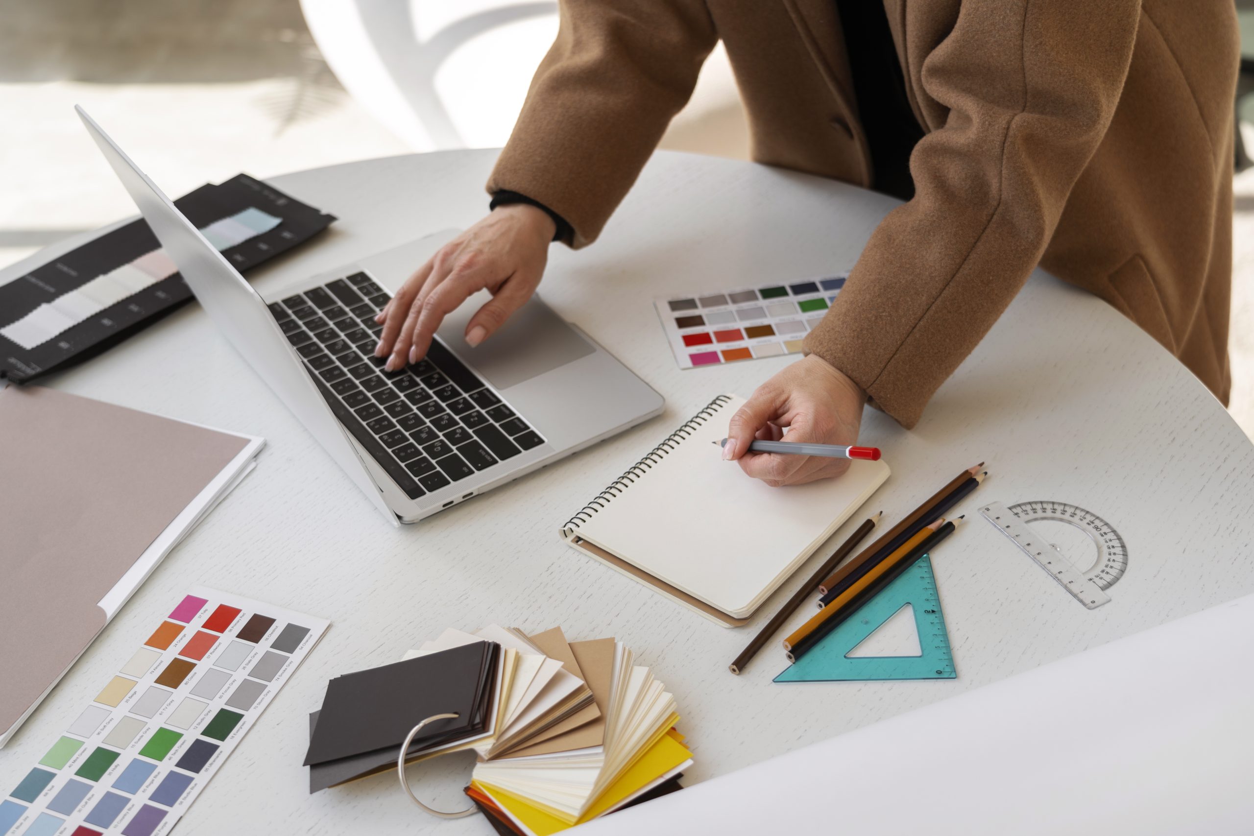 high-angle-woman-working-as-interior-designer